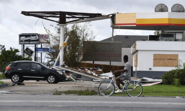 Hurricane Ida's direct hit on the nation's oil and gasoline industry could send gas prices higher. Pictured is damaged Shell station in Kenner