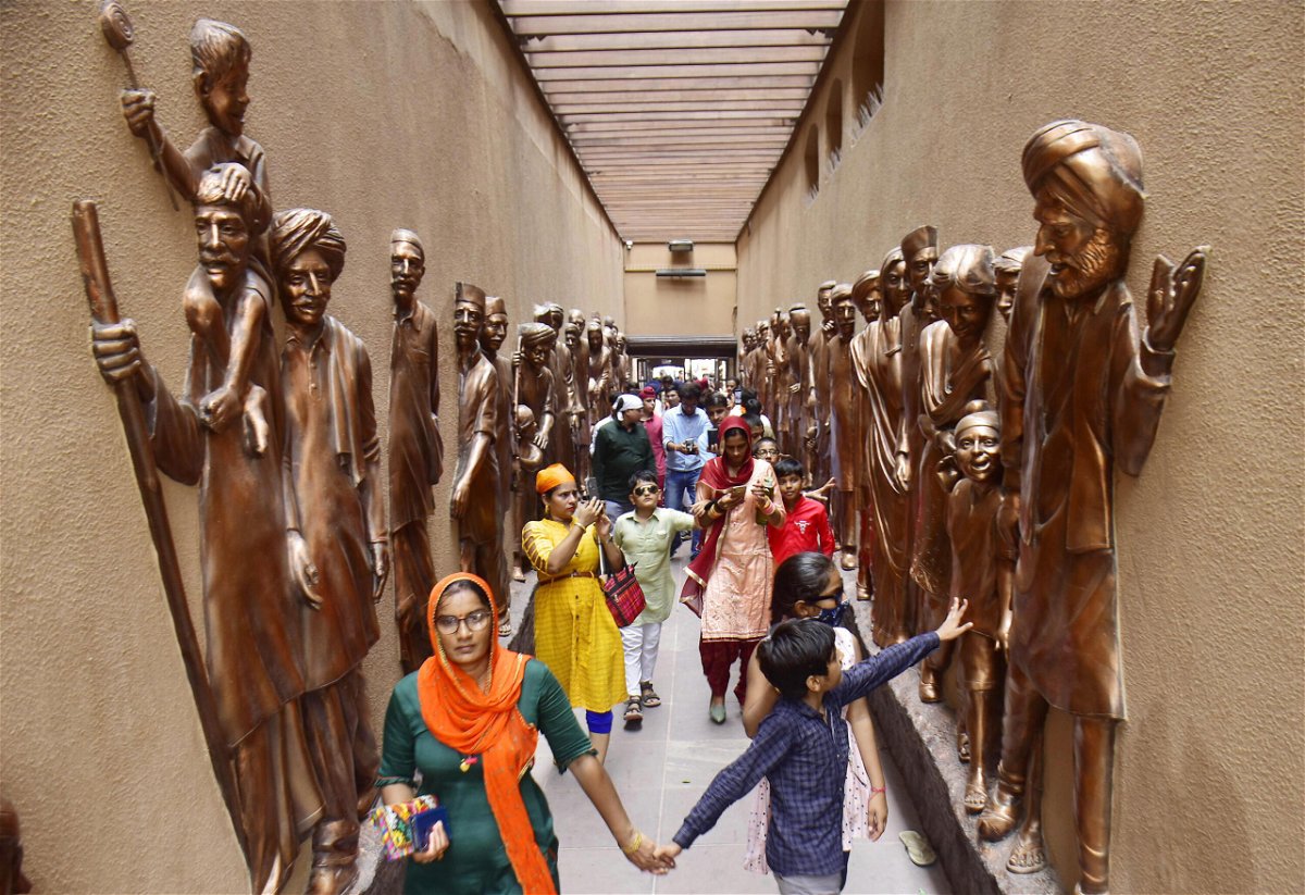 <i>Sameer Sehgal/Hindustan Times/Getty Images</i><br/>Visitors at the Jallianwala Bagh memorial after its reopening