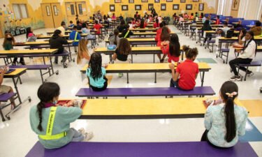 Students eat their lunch socially distanced at Belvedere Elementary School in West Palm Beach