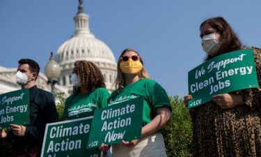 The League of Conservation Voters and Climate Power plan pro-climate pressure campaigns during August recess. Activists are seen here  outside the US Capitol on July 28