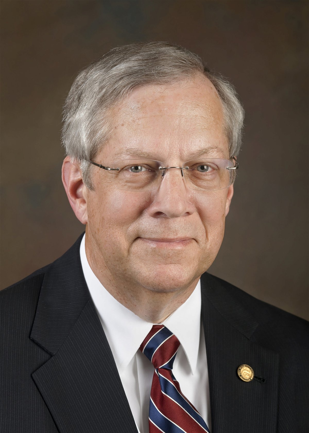 David  R. Russell, associate vp, University of Missouri System