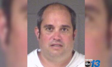 Scott Everett Ford is accused of attempting to run down a homeless man and his cat in Asheville