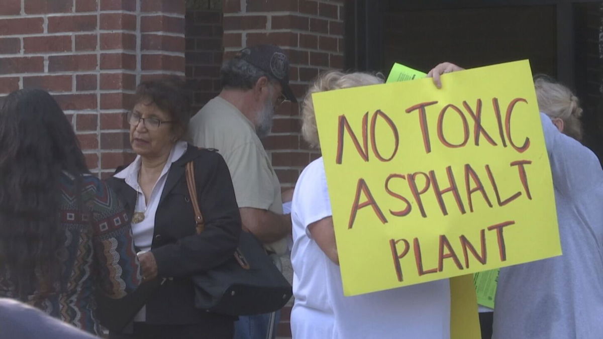 <i>WNEM</i><br/>Residents concerned over public health risks of a proposed asphalt plant rallied in a Flint neighborhood on Sept. 1.