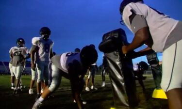 The Saint Augustine's football team during an early morning practice