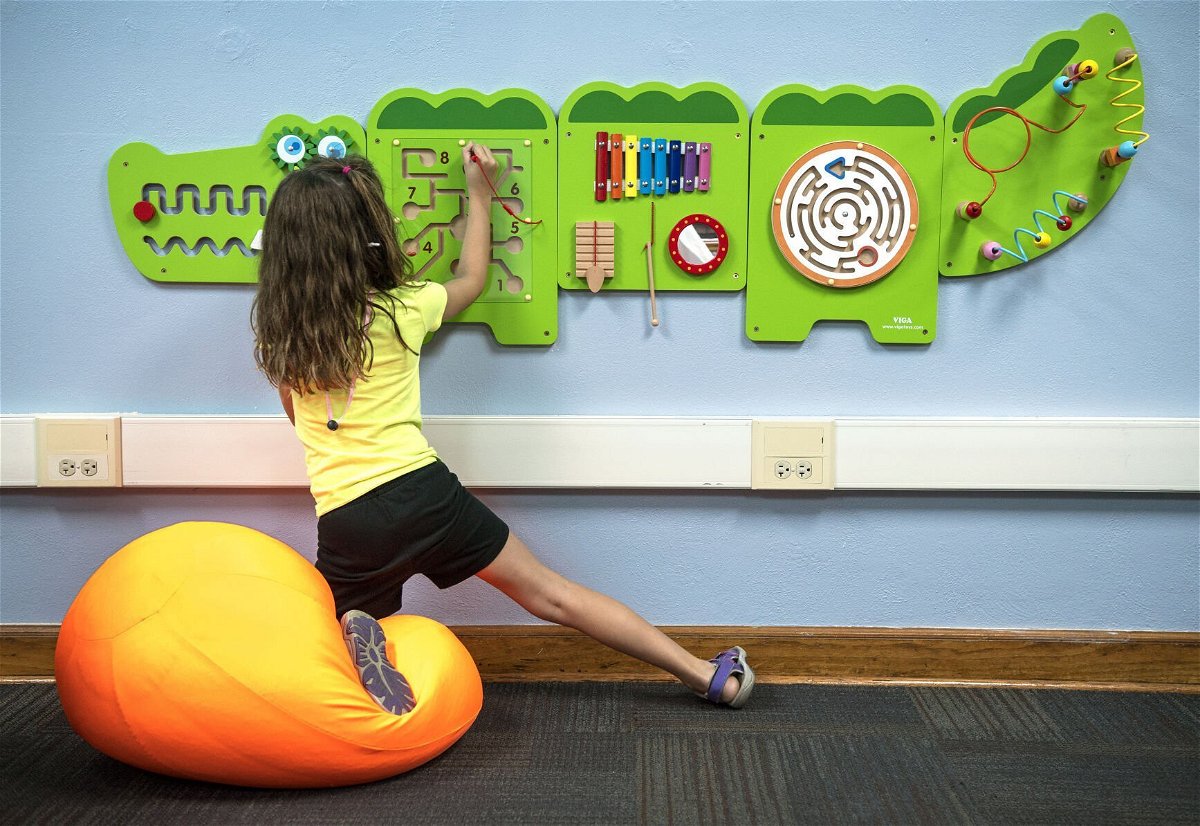 <i>Francis Gardler/Lincoln Journal Star</i><br/>Seven-year-old Avery Walls plays with a fidget board in the new sensory room at Weeping Water Elementary School.