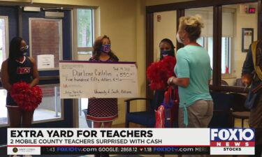 Two Mobile County teachers received a couple hundred bucks to help further education in local schools.