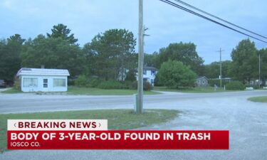 The town of Oscoda is shocked after police found the body of a three-year-old in a garbage bag.