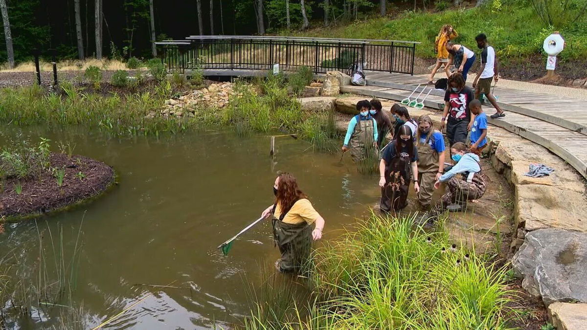 <i>WLOS</i><br/>Students from Asheville's Hillcrest community took a field trip to the NC Arboretum with a UNC Asheville after-school program to get a bit closer to nature.