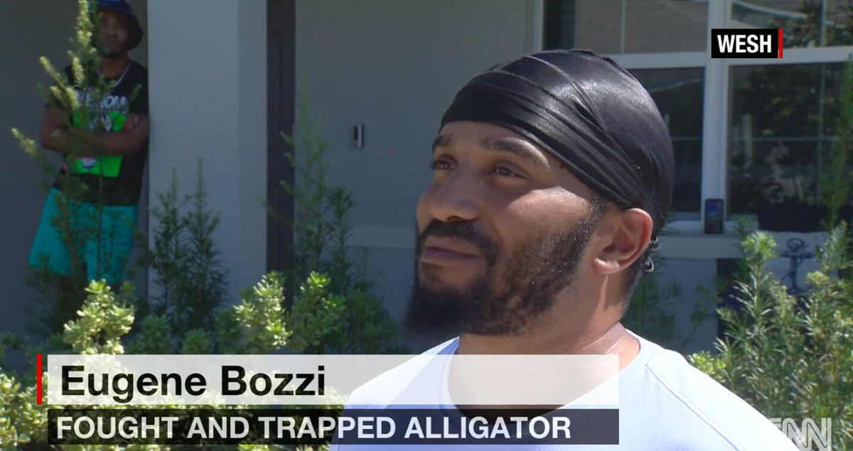 <i>WESH</i><br/>Eugene Bozzi lured an alligator inside a garbage can on Tuesday.