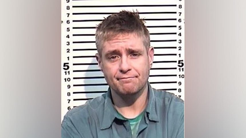 <i>Bonneville County Jail via EIN</i><br/>Eli Lewis reportedly set the mobile home he lived in with his ex-girlfriend on fire 