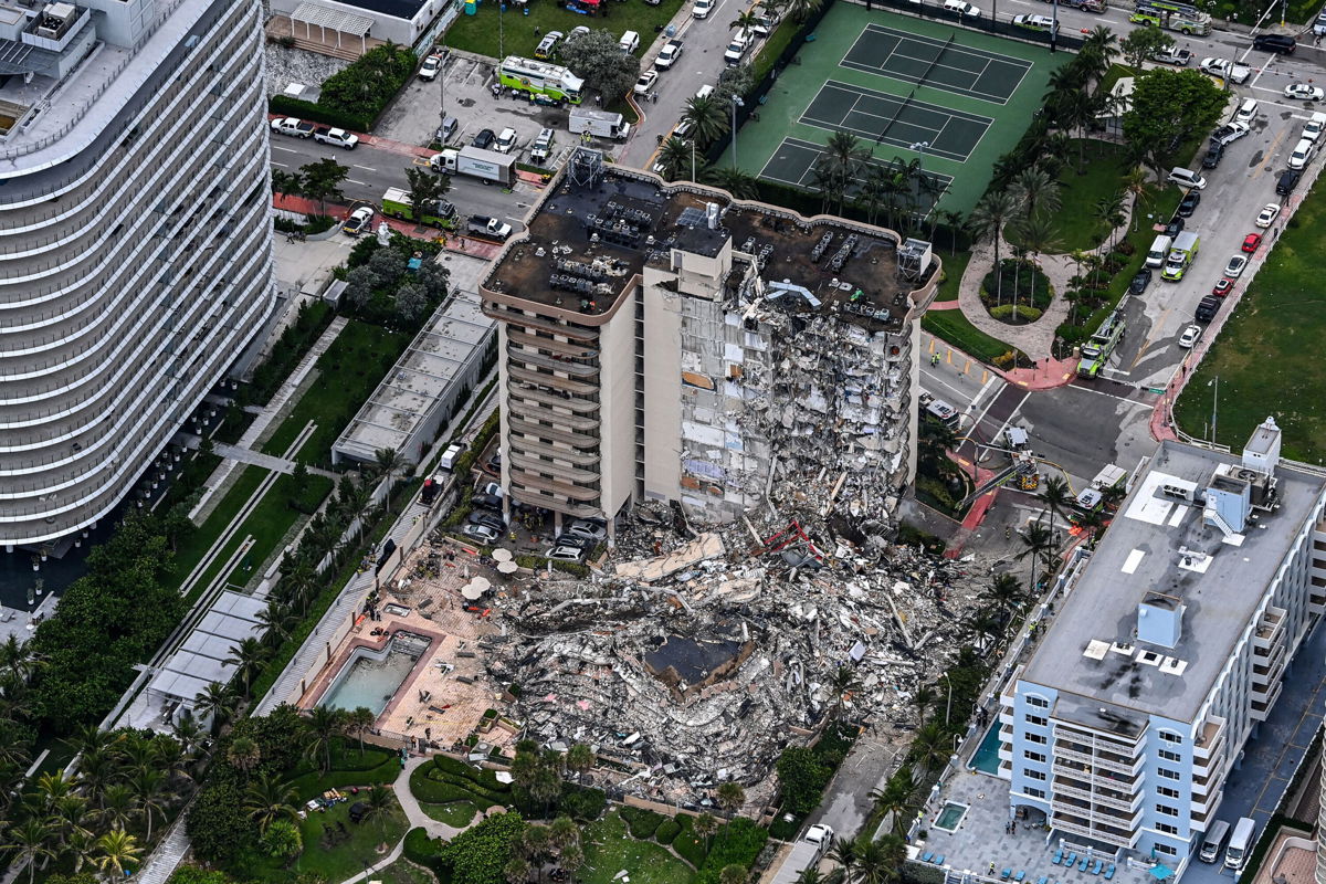 <i>Chandan Khanna/AFP/Getty Images</i><br/>Three people have been reportedly arrested in South Florida and accused of identity theft of victims of the Surfside condo collapse.