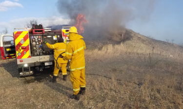 Naval Station Guantánamo Bay emergency personnel work to contain a wildfire on the installation on February 22