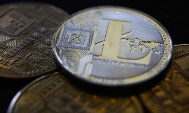 Cryptocurrency litecoin surged around 25% early Monday after a falsified news release said Walmart would begin accepting the payment for online purchases.