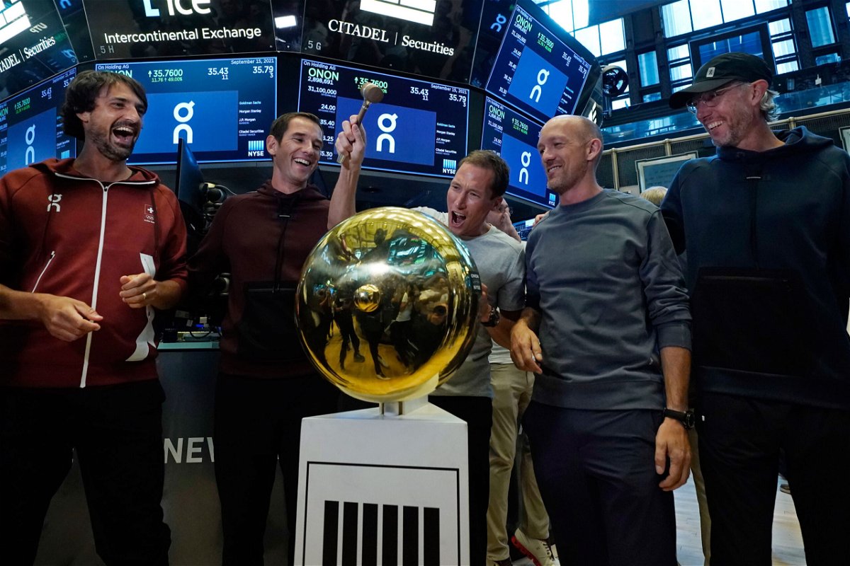 <i>Richard Drew/AP</i><br/>On executives ring a ceremonial first trade bell as their company's IPO begins trading on the floor of the New York Stock Exchange