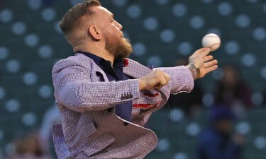 Conor McGregor throws out his first pitch at Wrigley Field.