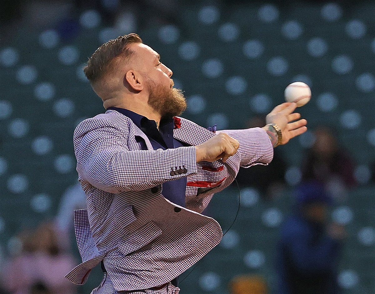 <i>Jonathan Daniel/Getty Images North America/Getty Images</i><br/>Conor McGregor throws out his first pitch at Wrigley Field.