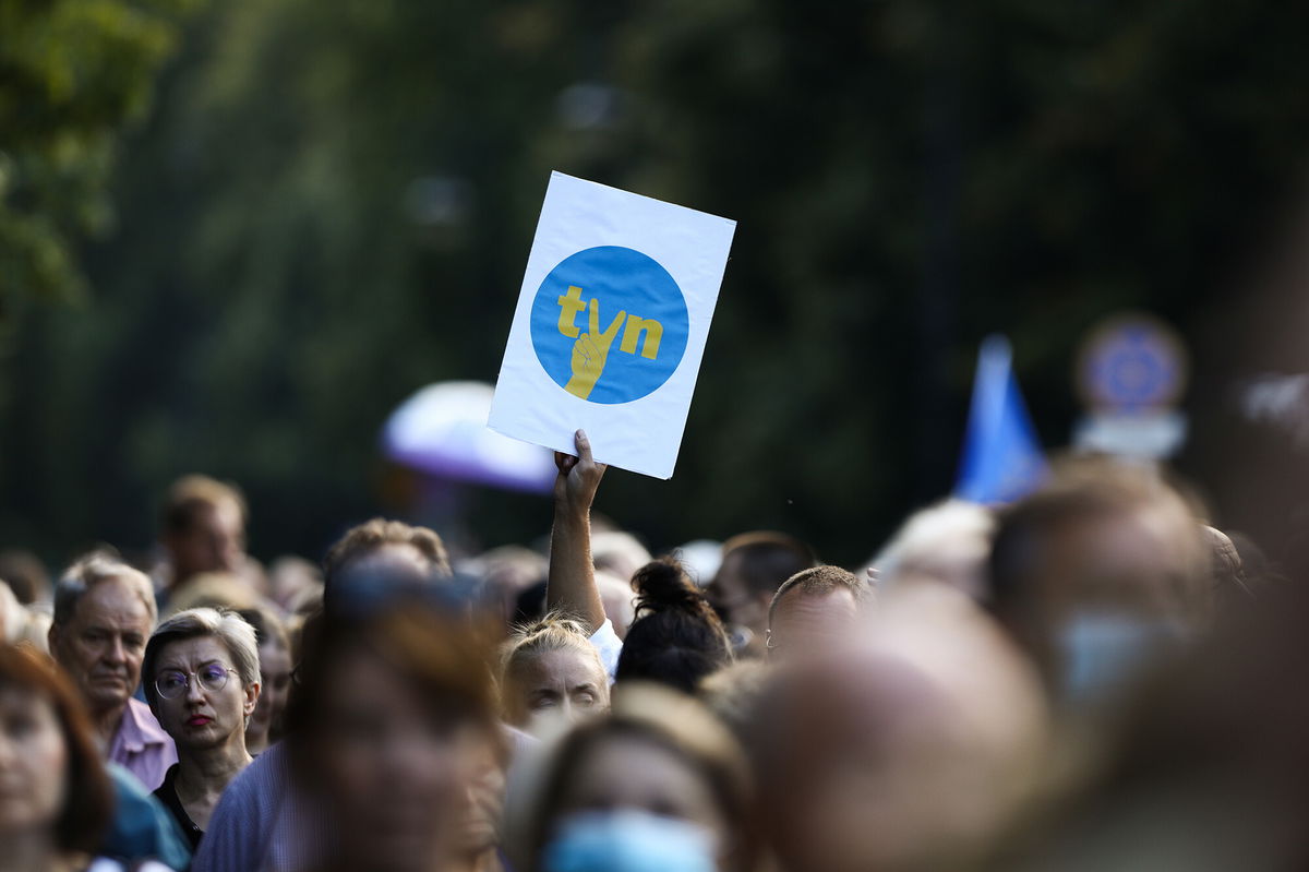 <i>STR/NurPhoto/Getty Images</i><br/>Freedom of the press is under attack in Poland. A demonstrator holds up a sign with the TVN logo modified with the communist era V sign indicating solidarity and freedom in Warsaw