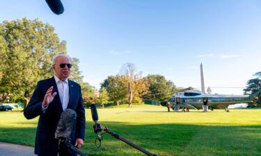 President  Biden speaks to members of the media as he arrives at the White House in Washington