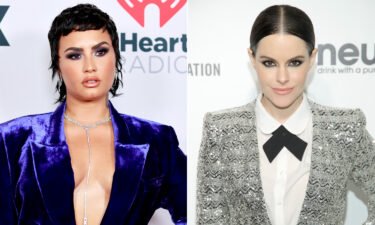 The 'Schitt's Creek' star Emily Hampshire says Demi Lovato asked her out on a date on Lovato's podcast.