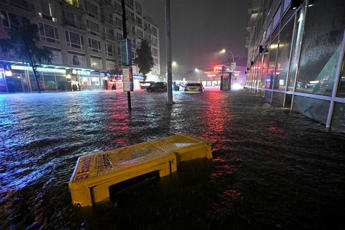 <i>Anthony Behar/SIPP USA/AP</i><br/>Stalled cars caught in a flash flood near Queens Boulevard in the New York City borough of Queens on September 1.