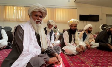 A meeting at a local court set up by the Taliban in Gardez is seen.