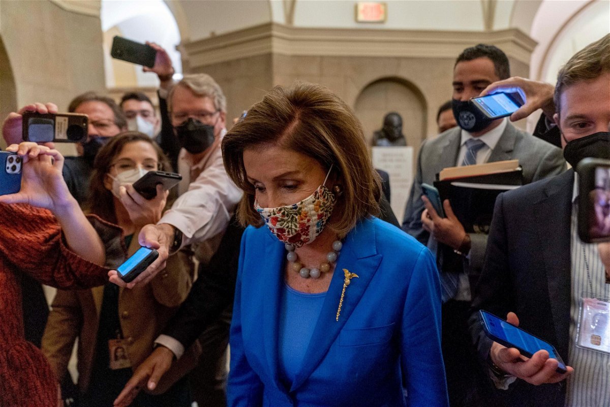 <i>Andrew Harnik/AP</i><br/>Pelosi's effort to pass the infrastructure bill is complicated by West Virginia Sen. Joe Manchin