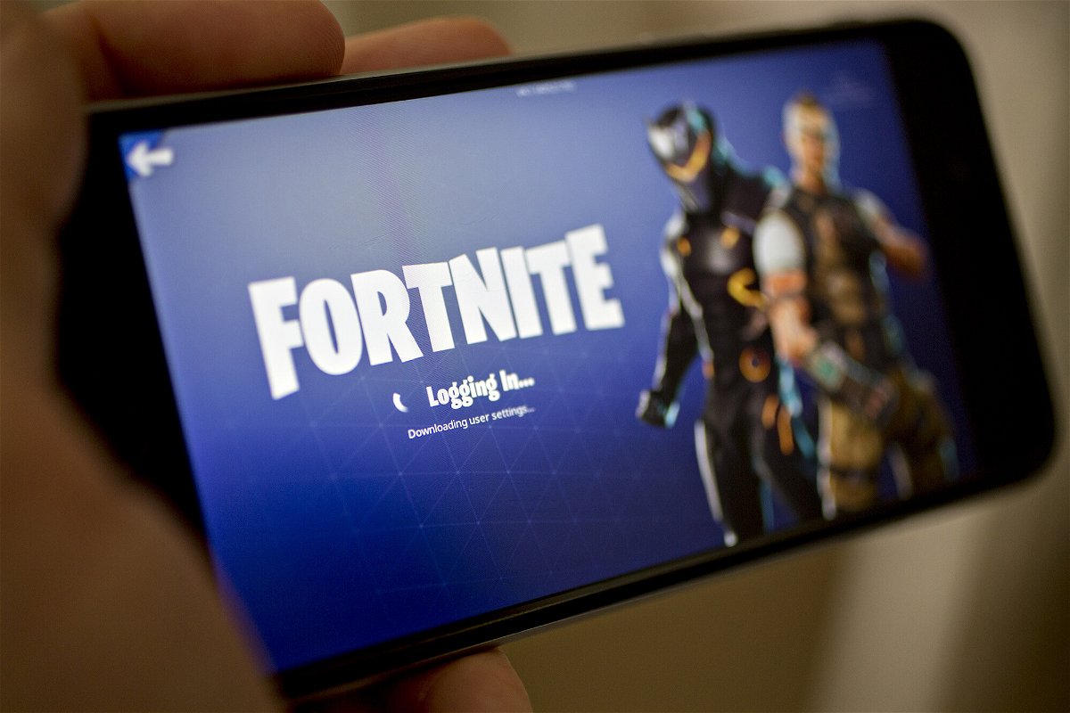 <i>Andrew Harrer/Bloomberg/Getty Images</i><br/>The Epic Games Fortnite: Battle Royale video game is displayed on an iPhone.