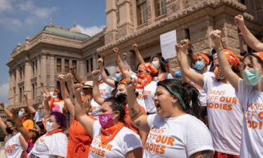 A federal judge set a hearing date for October 1 to consider a request from the Justice Department to freeze a Texas law that bars most abortions after six weeks of pregnancy