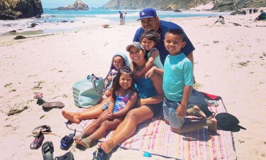 Daniel and Davy Macias with their four children. A fifth