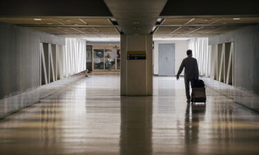 Airlines were counting on a post-Labor Day surge in business travel. It looks like that won't happen. A traveller here walks through the George Bush Intercontinental Airport on August 05