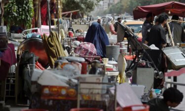 More than $1 billion in aid is pledged for Afghanistan to ease one of the world's "worst humanitarian crises." This photo taken on September 12 shows a  a market in the northwest neighbourhood of Khair Khana in Kabul.