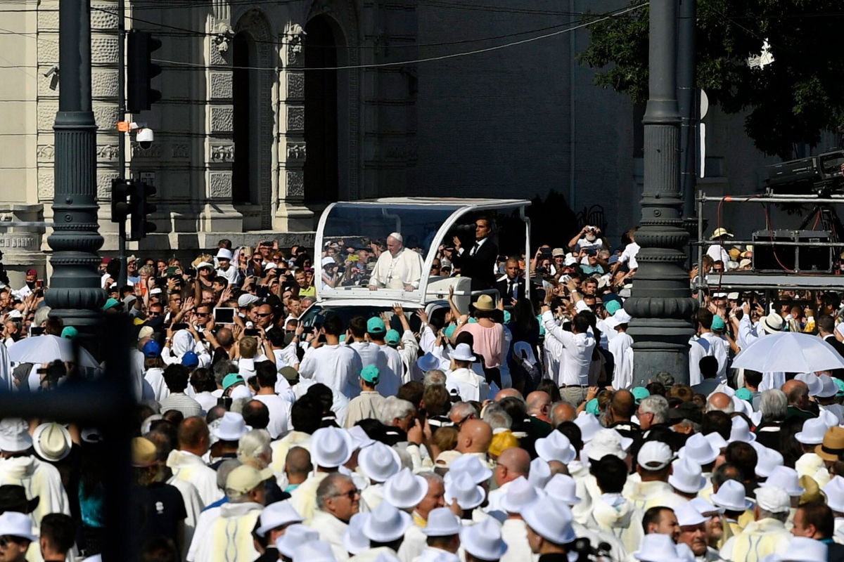 <i>Zoltan Mathe/MTI/AP</i><br/>Francis arrives in his popemobile to celebrate mass for the closing of the International Eucharistic Congress at Budapest's Heroes Square.