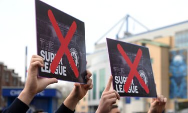 Chelsea fans protest against the proposed European Super League prior to the Premier League match between Chelsea and Brighton & Hove Albion at Stamford Bridge on April 20.