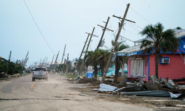 A motorist drives down a road in the wake of Hurricane Ida on September 4