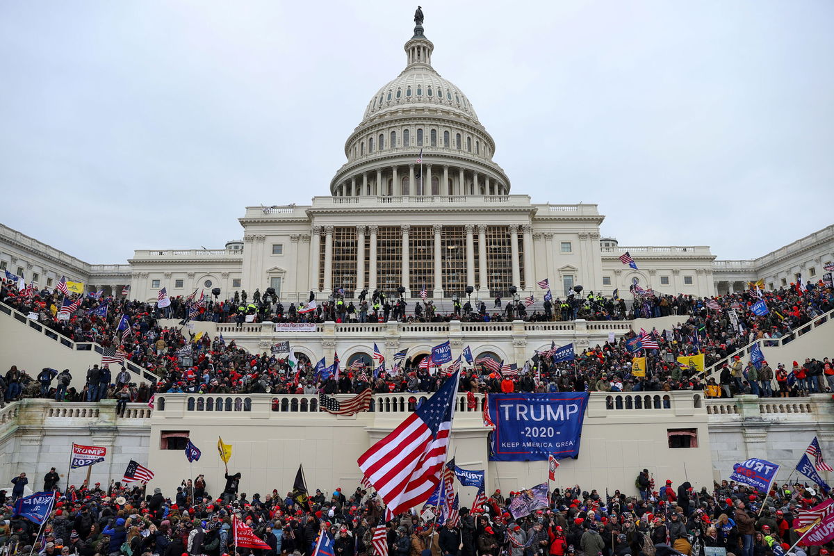 <i>Tayfun Coskun/Anadolu Agency/Getty Images</i><br/>US President Donald Trumps supporters gather outside the Capitol building in Washington D.C.