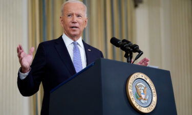 President Joe Biden speaks about the COVID-19 response and vaccinations in the State Dining Room of the White House