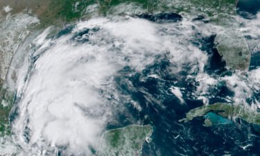 This satellite image provided by NOAA shows Tropical Storm Nicholas in the Gulf of Mexico on Sunday