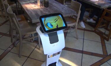 They will even sing 'Happy Birthday.' Robots are picking up unwanted jobs at a Latin restaurant in Texas.