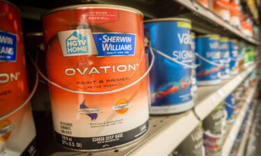 Cans of Sherwin-Williams brand paint are seen in a hardware store in New York on Monday