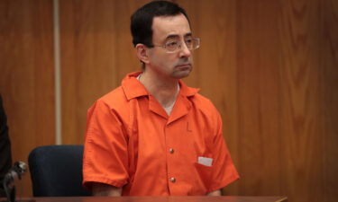 The FBI has fired an agent for failing to launch a proper investigation into Larry Nassar. The former USA Gymnastics doctor is seen here in Eaton County Circuit Court on February 5