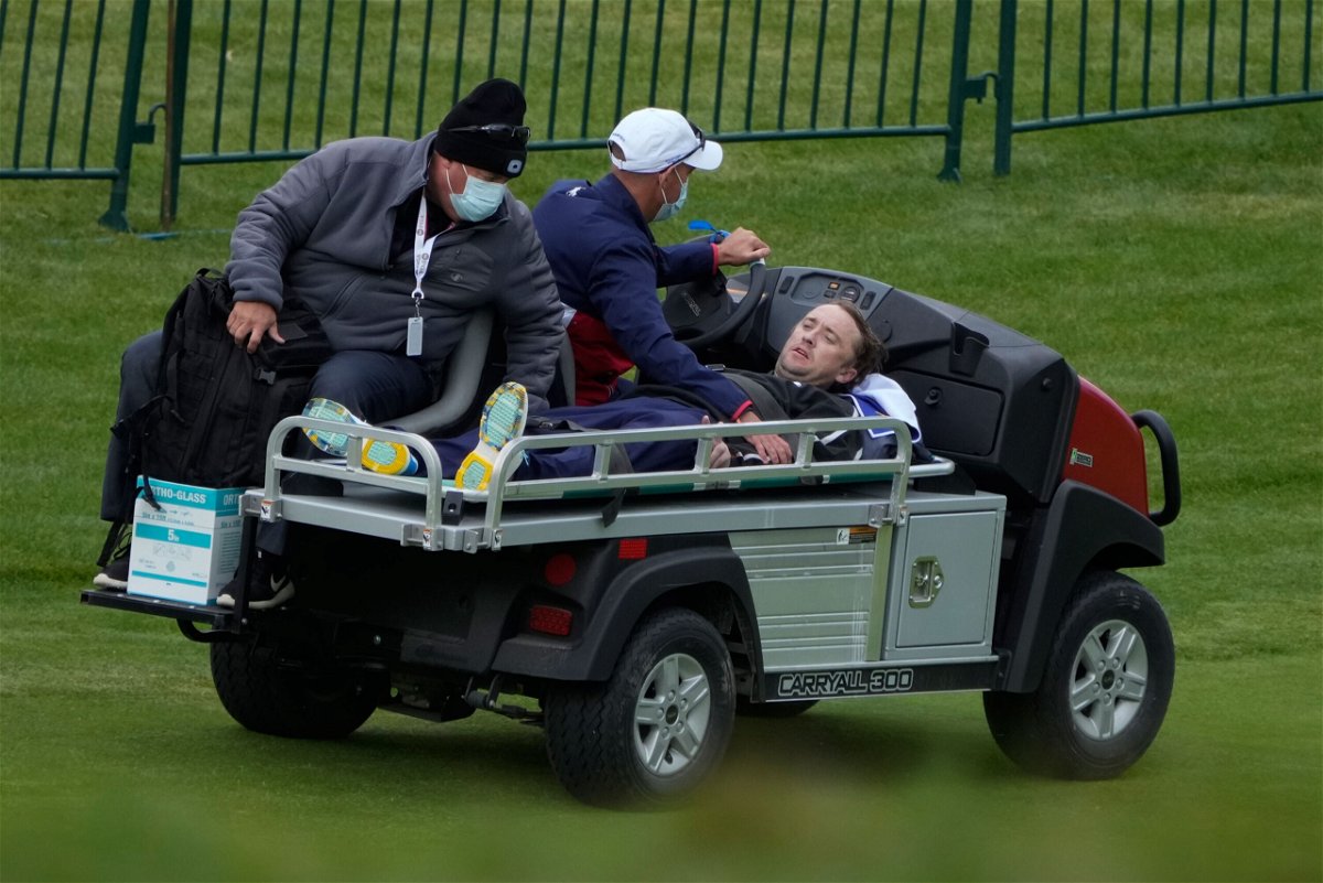 <i>Ashley Landis/AP</i><br/>Felton is carted off the course.