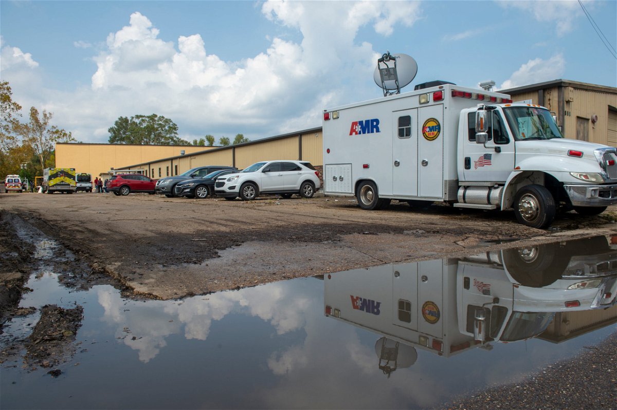 <i>Chris Granger/The Times-Picayune/The New Orleans Advocate/AP</i><br/>Emergency vehicles respond to evacuate people at a mass shelter on Sept. 2 in Independence