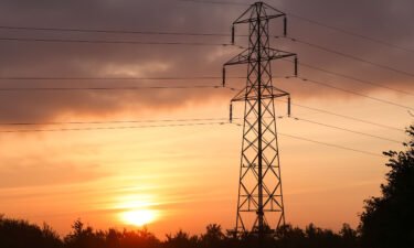 80 million European households struggle to stay warm. Rising energy costs will make the problem worse. Pictured is an electricity transmission tower near Rayleigh