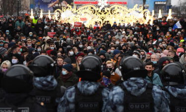 People attend a rally in support of Navalny in downtown Moscow on January.