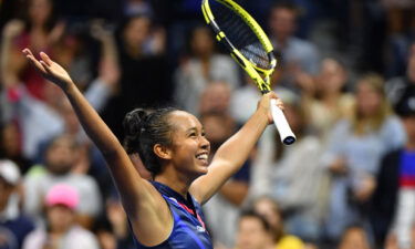 Canada's Leylah Fernandez celebrates after winning her third round match against Japan's Naomi Osaka.