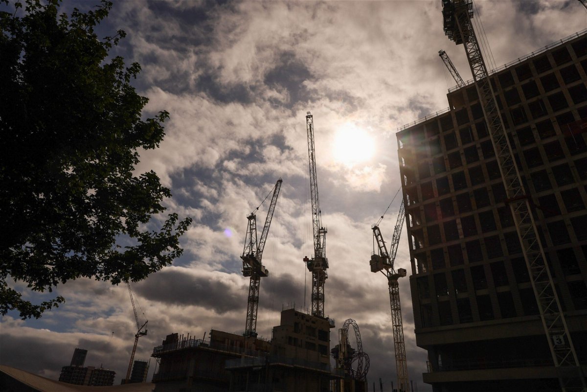 <i>Chris Ratcliffe/Bloomberg/Getty Images</i><br/>Cranes at a construction site in Stratford