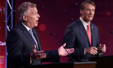 Democratic former Virginia Gov. Terry McAuliffe (left) debates Republican gubernatorial candidate Glenn Youngkin on September 28 in Alexandria