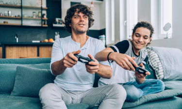 Play video games together at home.