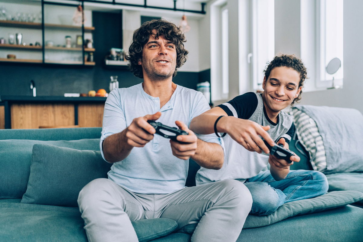 <i>filadendron/E+/Getty Images</i><br/>Play video games together at home.