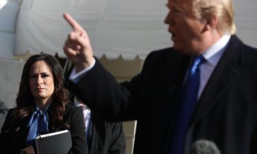 Trump's former press secretary details his mysterious 2019 hospital visit in her book. Stephanie Grisham here listens to former President Donald Trump talking to reporters outside the White House November 08